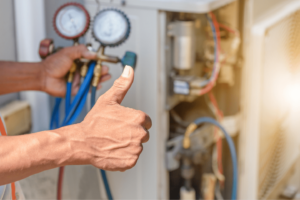Air conditioning repair with a thumbs up